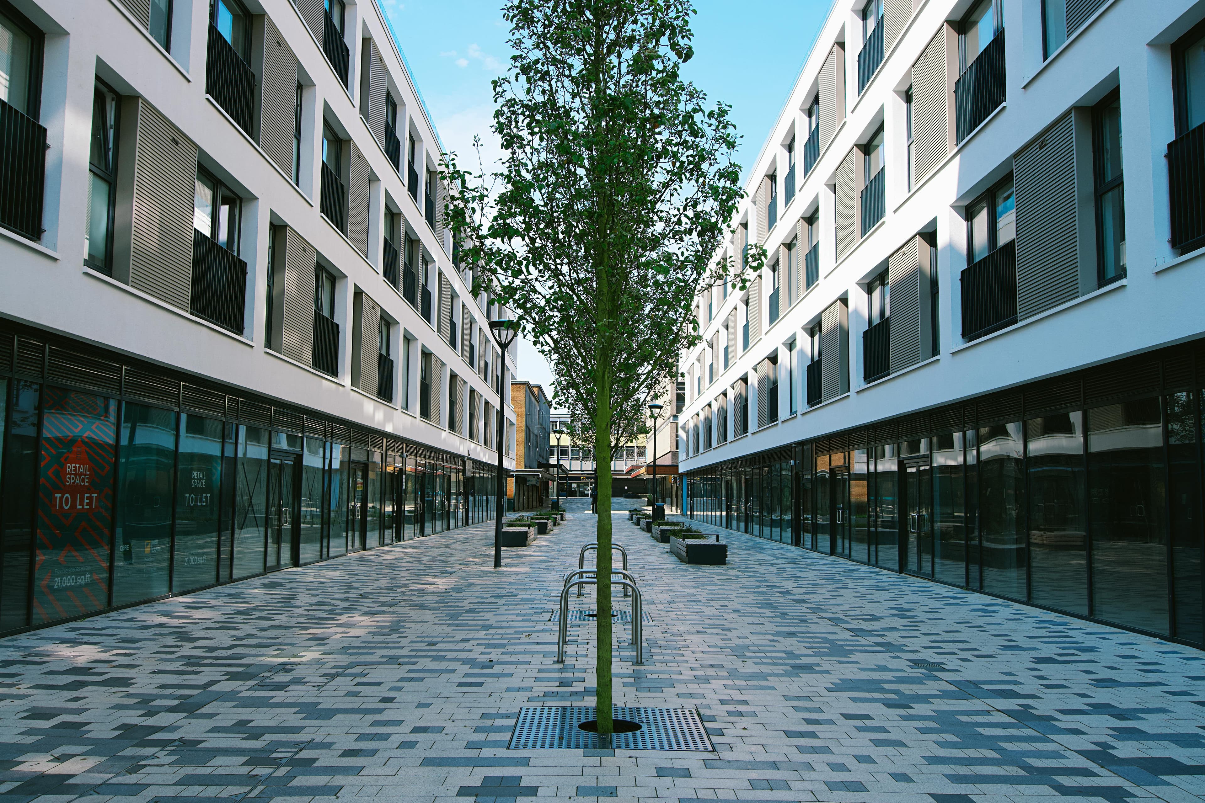 Row of empty retail units waiting for a new business and its premises licence