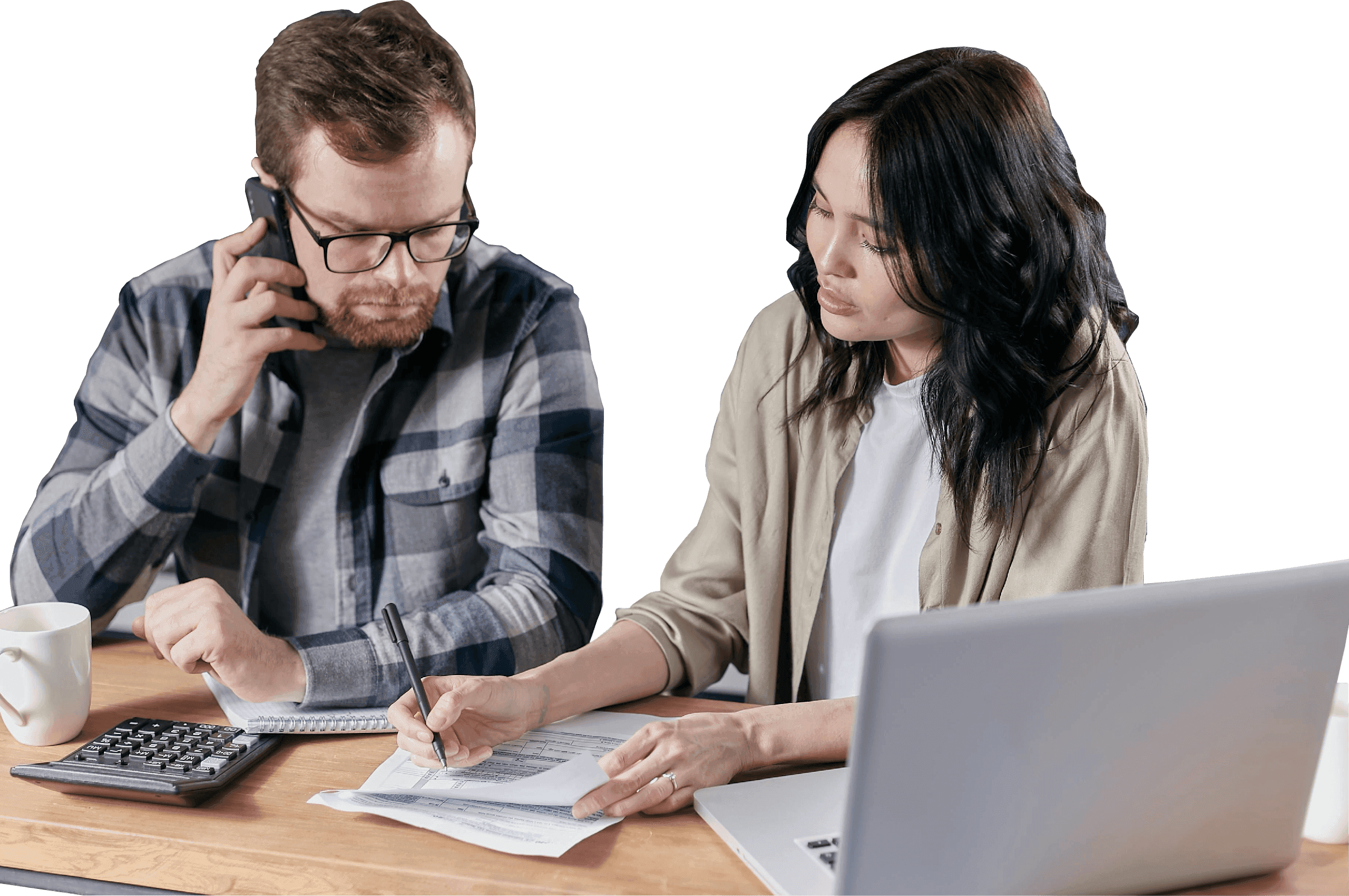 Business couple reviewing paperwork and discussing licensing with Barnab.