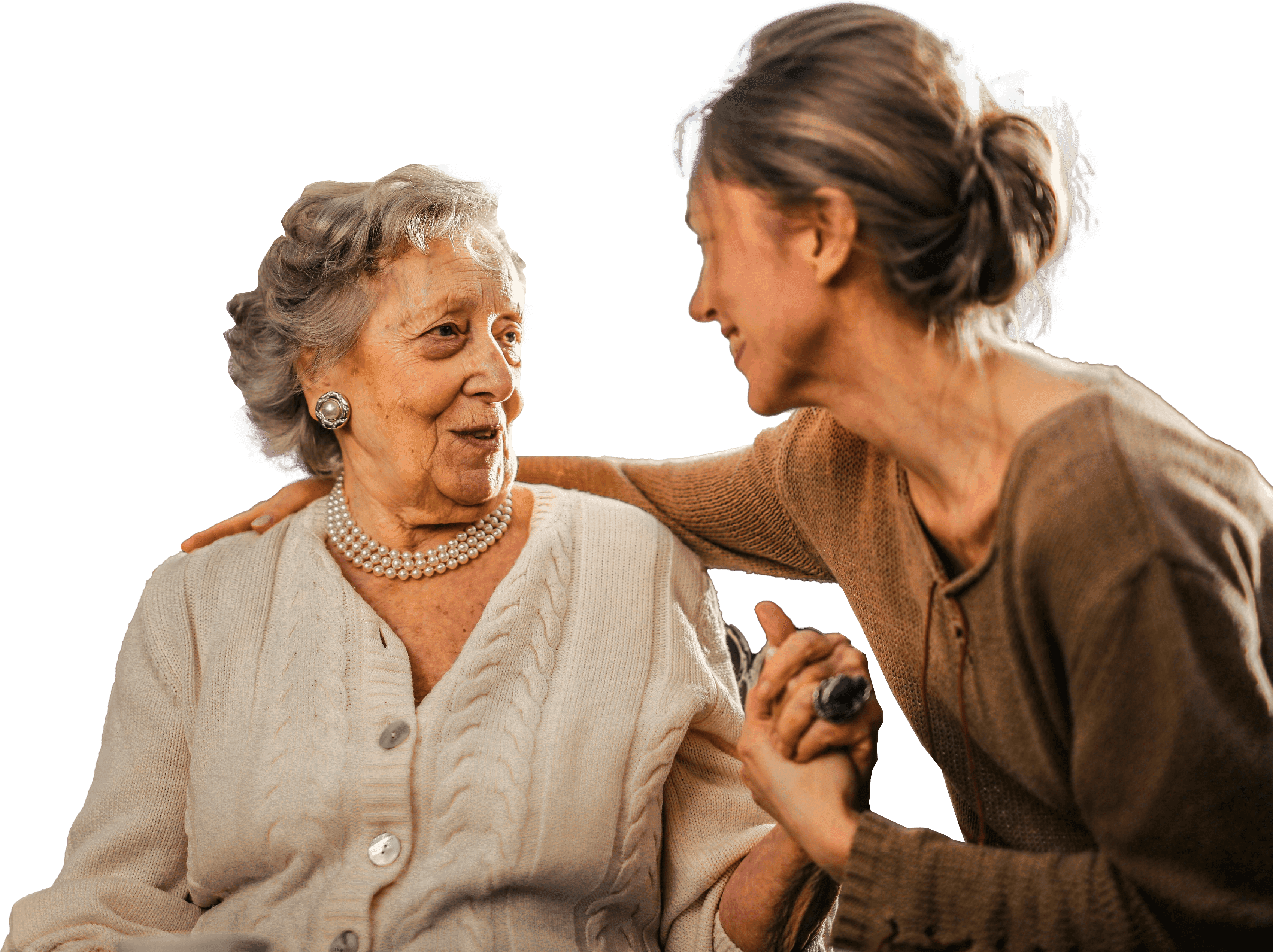 Elderly woman speaking with caregiver about applying for benefits using Barnab.